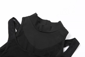 Detail of high neck black mesh patchwork and textured knit fabric on women's slim top