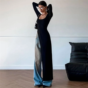 Detail view of black long sleeve square neck top with high side slit and slim fit design