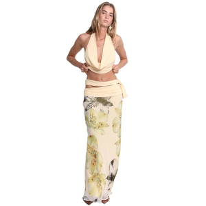 Detail of floral print maxi skirt and halter neck top set with lily patterns