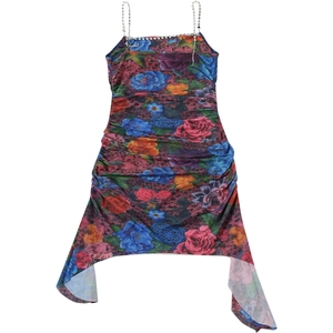 Detail of floral print dress featuring crystal chain straps and ruched asymmetrical hemline