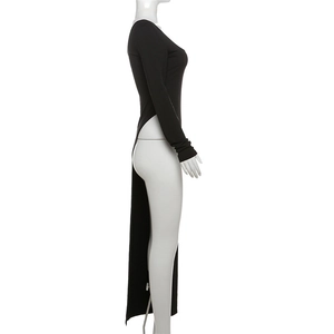 Detail of slim-fit black long-sleeve dress featuring a high side slit design