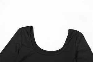 Detail of the high-quality stitching on the deep U-neck of this black slim-fit T-shirt