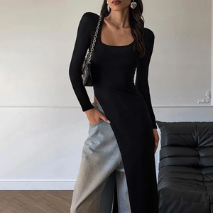 Slim fit black long sleeve T-shirt with irregular high slit hem and stretchy fabric