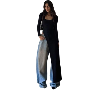 Slim fit black long sleeve top with irregular high split hem and wide leg jeans