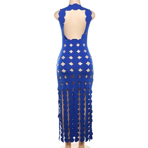 Detail of laser-cut hollow patterns and open back design on a royal blue maxi dress