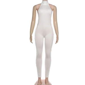 Detail of white sleeveless halter neck bodysuit with a sleek backless design and slim fit