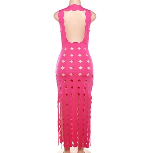 Detail view of pink bodycon maxi dress with back wave cut-out and laser-cut patterns