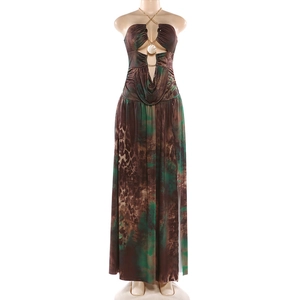 Detail of gold chain halter neck and v-neck cutout on printed bohemian maxi dress