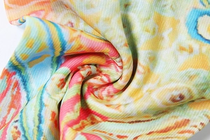 Macro detail of abstract colorful printed fabric with fine texture and artistic patterns