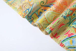 Macro shot of colorful abstract print fabric with clean double-stitched hem finish