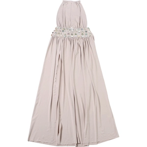 Detail of light beige halter dress featuring sequins and a side slit at the waist
