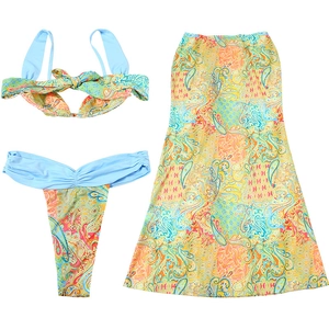 Detailed flat lay of three-piece paisley print bikini set with high waist maxi skirt