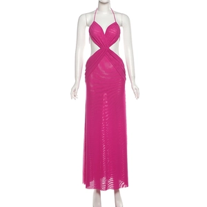 Detail of rose pink halter maxi dress featuring waist cut-outs and mesh texture fabric