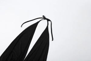 Detail of black halter neck mesh dress with sexy deep V-neckline and tie-up strap design