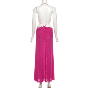 Detail of fuchsia backless halter dress showing ruched back and crisscross tie design