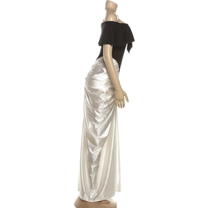 Detail of off-shoulder ruffled neckline and side drawstring draping on colorblock dress