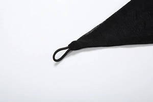 Close-up of black mesh fabric detail with elastic loop on sexy deep V-neck dress