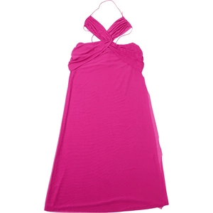 Detail of the criss-cross halter neckline and pleated bodice on a hot pink mini dress