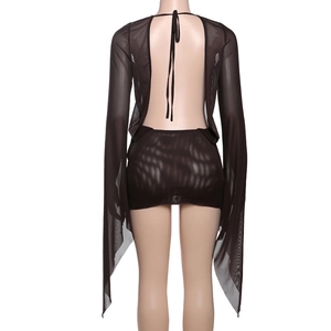 Detail of deep brown mesh two-piece set featuring backless lace-up top and mini skirt
