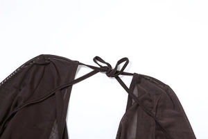 Detailed close-up of dark brown mesh fabric with halter neck tie and neat stitching