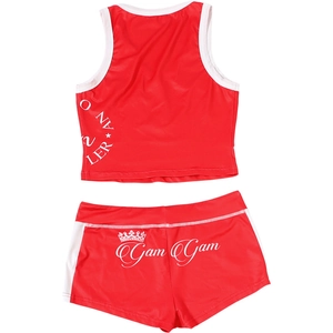 Flat lay of red two-piece sports set with cropped halter top and high-waist shorts