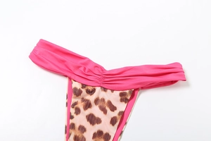 Close-up of contrast pink pleated waist and leopard print pattern bikini bottoms