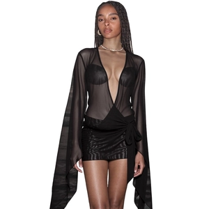 Detail of sexy black see-through mesh long sleeve top and ruched mini skirt set for women