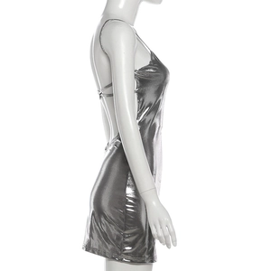 Side view of silver metallic backless bodycon mini dress on a mannequin