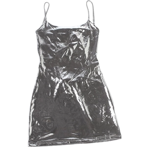 Detail of silver metallic camisole dress showing thin straps and pleated mirror fabric