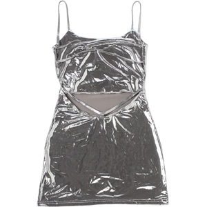 Detail of silver metallic mini dress featuring waist cut-outs and criss-cross straps