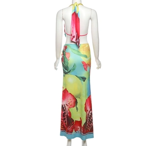 Detailed back view of a summer floral halter top and split maxi skirt set for women
