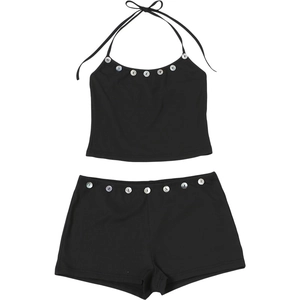 Detail of black ribbed knit crop top and shorts set with decorative shell buttons