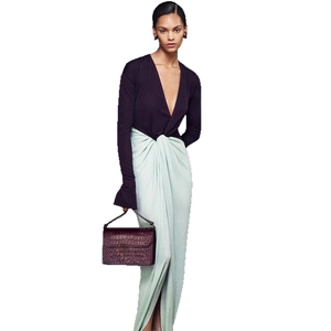 Elegant deep V-neck long sleeve top and pleated slit maxi dress with crocodile texture handbag