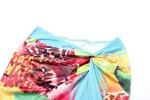 Detailed twist knot waist with abstract colorful print on stylish summer skirt
