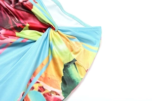 Detailed close-up of the knot design and tropical floral pattern on the summer skirt set