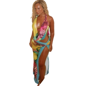 Floral halter neck top and side slit maxi skirt set in vibrant tropical prints