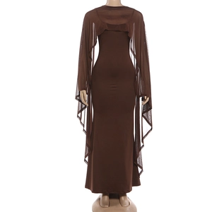 Detail of slim fit maxi dress with sheer irregular shawl in dark brown knit