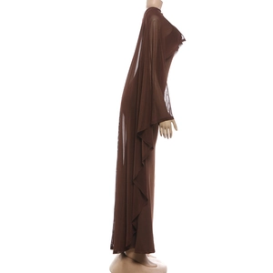 Detail of dark brown mesh maxi dress with sheer shawl sleeves and draped texture