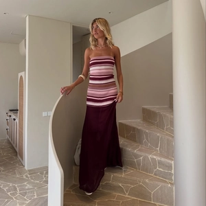 Detail of striped tube top and wine red mesh skirt set with sheer textures
