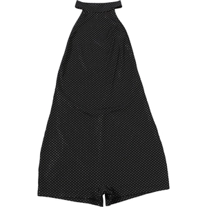 Detail of the backless halter neck design on this black polka dot romper for women