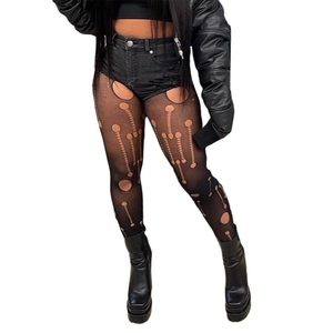 Leggings neri da donna in mesh trasparente con design a motivi traforati irregolari