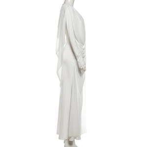 Detail of elegant white long sleeve dress with side draping and Greek goddess style