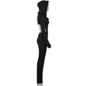 Side view of hooded backless bodysuit showing slimming lines and tight knit fabric