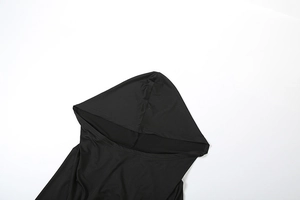Detail of the oversized hood on a black backless long sleeve bodysuit for women