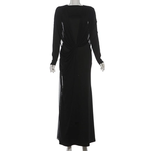Detailed close-up of the elegant twist knot design on a black long sleeve maxi dress