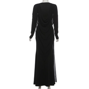 Detail of the elegant draped cowl back design on a slim fit black mesh long dress