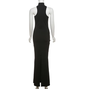 Rear view of a black slim-fit halter maxi dress featuring a racerback and back slit detail