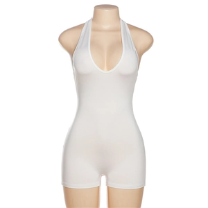 Detail of white halter neck bodysuit featuring a deep U-back and slim-fit ribbed fabric