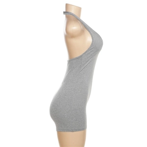 Side view of grey backless halter neck romper in soft knitted fabric on a mannequin