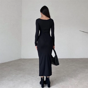 Rear view of sleek black long sleeve bodycon dress with hidden zipper detail